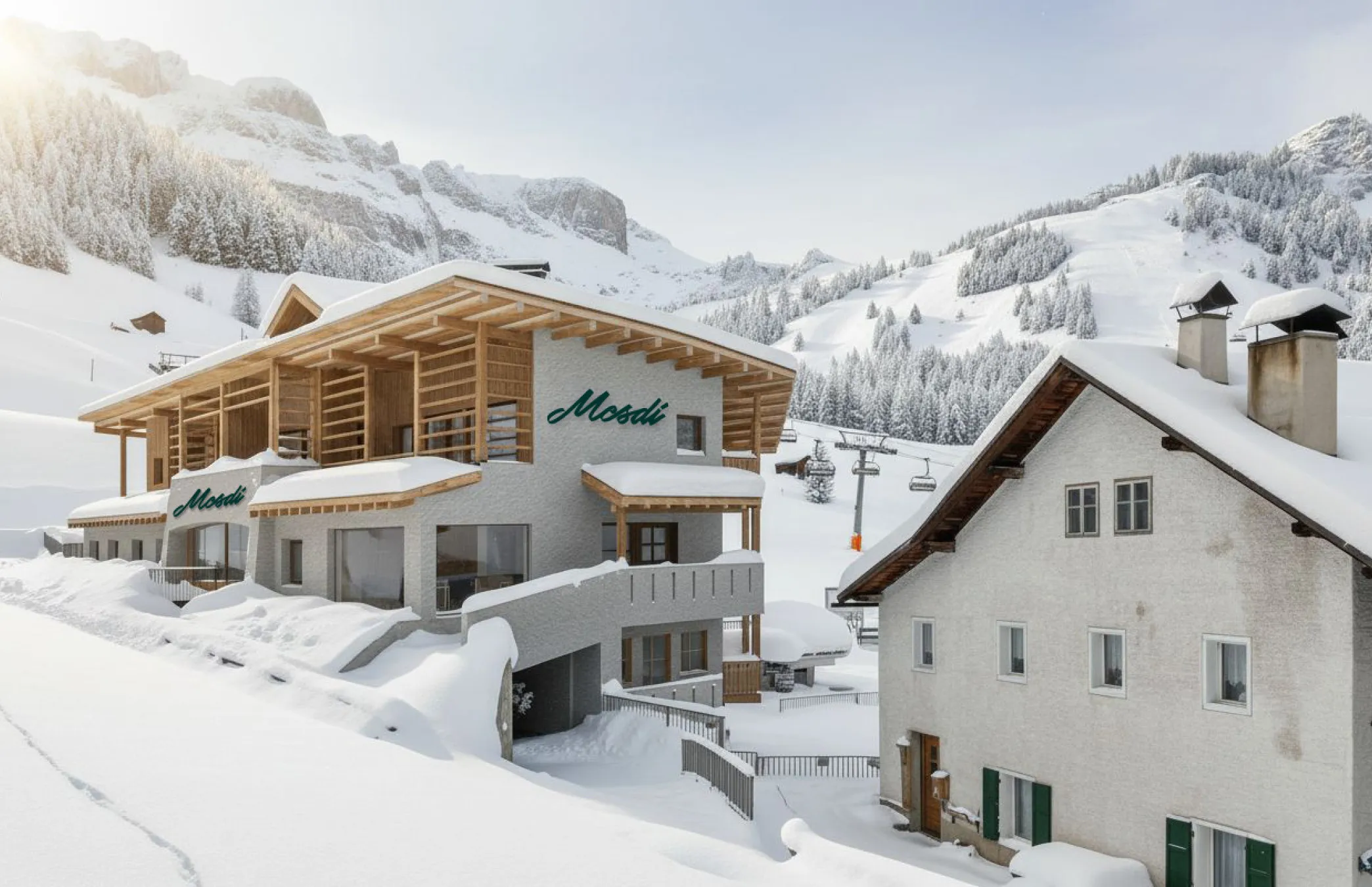 Hotel Mesdì im Winter mit direktem Ski-in/Ski-out Zugang zu den Pisten – ideal für Skibegeisterte.